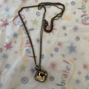 Long stunning crown necklace.